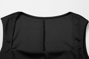 Detailed close-up of the square neckline and fine stitching of the black summer mini dress
