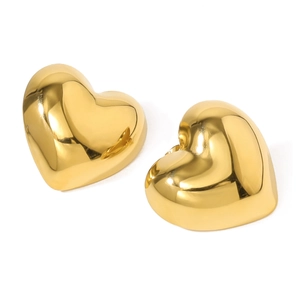 Close-up of minimalist heart earrings with high-polished 18K gold plated mirror finish