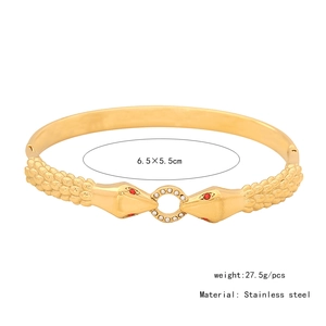 Detail view of gold stainless steel snake bracelet showing dimensions and weight info