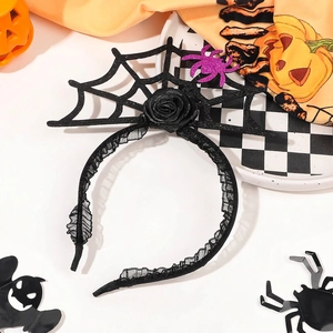 Halloween headband detail with black spider web, fabric rose and glitter spider