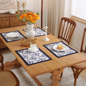Set of four blue floral cotton linen placemats with vintage lace edges for dining table