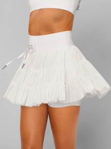 Detail view of white layered tulle mini skirt with drawstring waist and inner lining