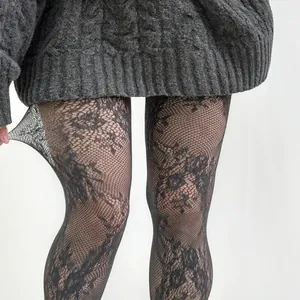Black floral lace fishnet tights with intricate cutout pattern and mesh texture