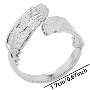 Detail view of the silver wing ring showing clear feather texture and 1.7cm inner diameter