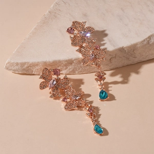 Elegant butterfly tassel earrings with colorful rhinestones and blue teardrop gems