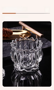 Detailed macro of textured glass storage jar with crown edge and vertical ribbing decor