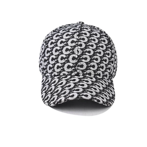 Classic black and white baseball cap featuring all-over C-pattern jacquard texture