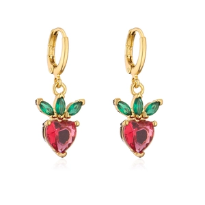 Close-up of gold plated strawberry hoop earrings with red heart stones and green crystals