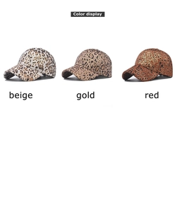 Three leopard print faux suede baseball caps in beige, gold, and red color options