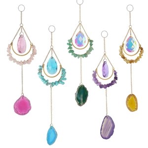 Handmade rainbow suncatcher with natural agate slices and crystal crescent moon pendants
