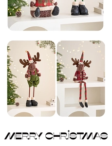 Detail of plush Christmas reindeer dolls with adjustable legs on a festive white shelf