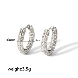 Detail view of silver pave-set crystal hoop earrings with 16mm height and 17mm width