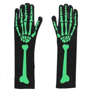 Detail of long black Halloween gloves with neon green skeleton bone prints and long nails