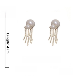 Detailed specs of pearl tassel earrings with 925 silver pins, 4cm length and 10.4g weight