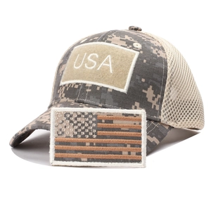 Detail of USA tactical baseball cap with digital camouflage and American flag patch