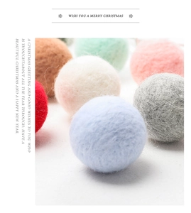 Macro shot of colorful wool felt balls for Christmas DIY crafts and holiday decorations