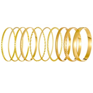 10-piece set of gold-tone alloy bangles with varied textured and smooth designs