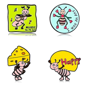 Set of four colorful cartoon ant metal enamel pins with music and happy motifs