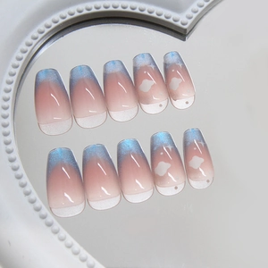 Blue and pink gradient cat-eye coffin fake nails with cloud design and shimmer finish