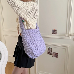 Close-up of lavender popcorn texture fabric on a large capacity tote bag for women