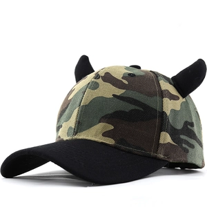 Adjustable camouflage baseball cap featuring black demon horns and cross patch design