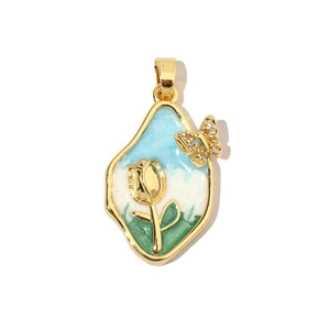 Detail showing 18k gold tulip and butterfly enamel pendant with sparkling crystals