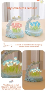 Detail of bird nest tulip night light with carved resin base and glowing flower petals