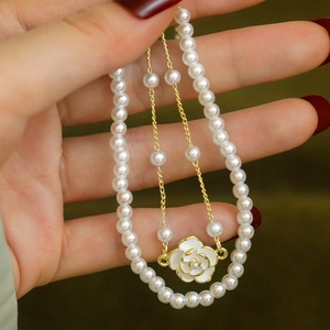 Elegant gold-plated pearl bracelet set with white camellia flower pendant for women