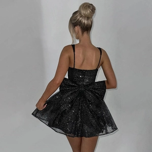 Sparkly black strapless mini dress with big bow decoration on back and flared A-line skirt