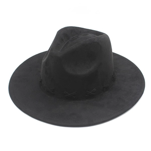 Detailed close-up of a black faux suede fedora hat with cross-stitch decorative trim