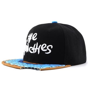 Flat brim baseball cap with donut embroidery, blue sprinkles brim and notch detail
