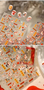 Macro shot of M1360 nail stickers with cartoon horse motifs and lucky symbols