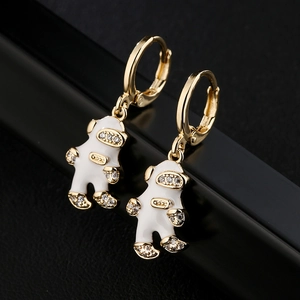 Gold plated astronaut drop earrings with white enamel and sparkling zircon stones