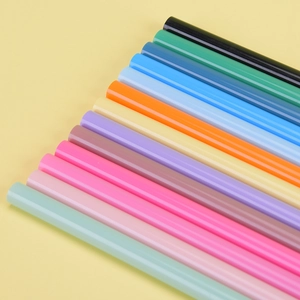 Colorful reusable Tritan straws in candy colors for plastic tumblers with diagonal layout