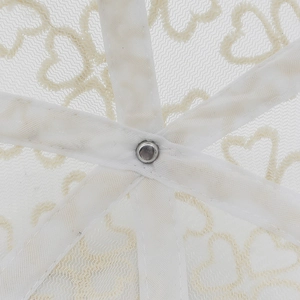 Detailed macro view of white lace baseball cap interior with heart mesh patterns
