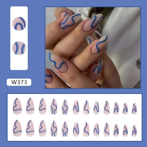 Matte almond press-on nails set featuring nude base with light blue wave patterns