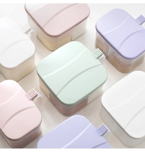 Top view of four-compartment plastic seasoning boxes in macaron colors with handles