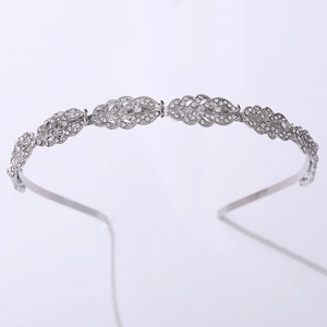 Elegant silver metal leaf headband with sparkling clear rhinestones for bridal hairstyle