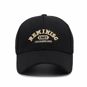 Classic black baseball cap featuring 1987 REMINISC embroidery with a structured hard top