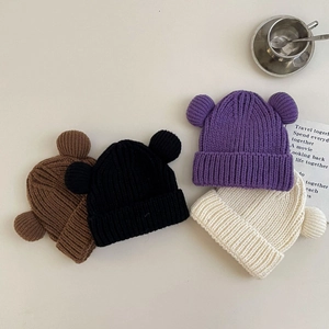 Cozy ribbed knit beanies with cute double pom ears in four stylish winter colors