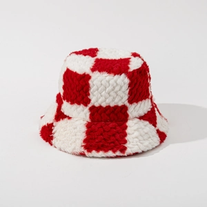 Detailed view of the soft plush fabric texture on this red and white checkered bucket hat