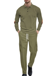 Detail of olive green knitted polo set showing textured fabric and cargo pant pockets