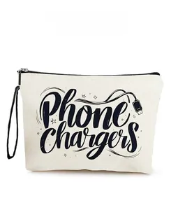 Detailed pattern display of the white canvas bag with PHONE CHARGERS printed design