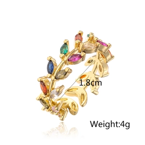 Detail of 18K gold leaf ring with colorful cubic zirconia and 1.8cm diameter sizing