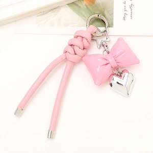 Pink leather bow keychain with heart pendant for handbags and car key decoration
