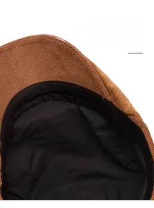 Gros plan détaillé du tissu en velours côtelé marron et de la bande de propreté en coton