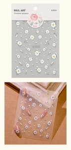 5D embossed daisy nail stickers showing 3D texture and realistic application effect