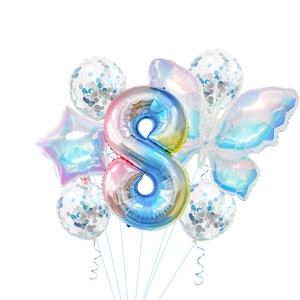 Close-up of rainbow butterfly and gradient number 8 balloon set for birthday party décor