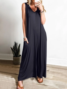 Close-up of sleeveless V-neck jumpsuit with side pockets on a professional model
