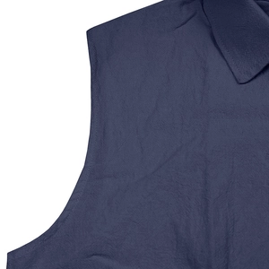 Detail shot of navy linen sleeveless shirt collar and woven fabric texture for men